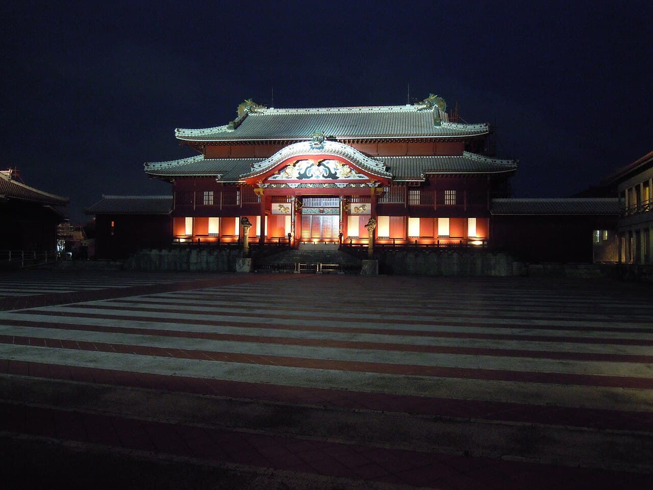 Shuri Castle main hall illuminated at night in Naha, Okinawa