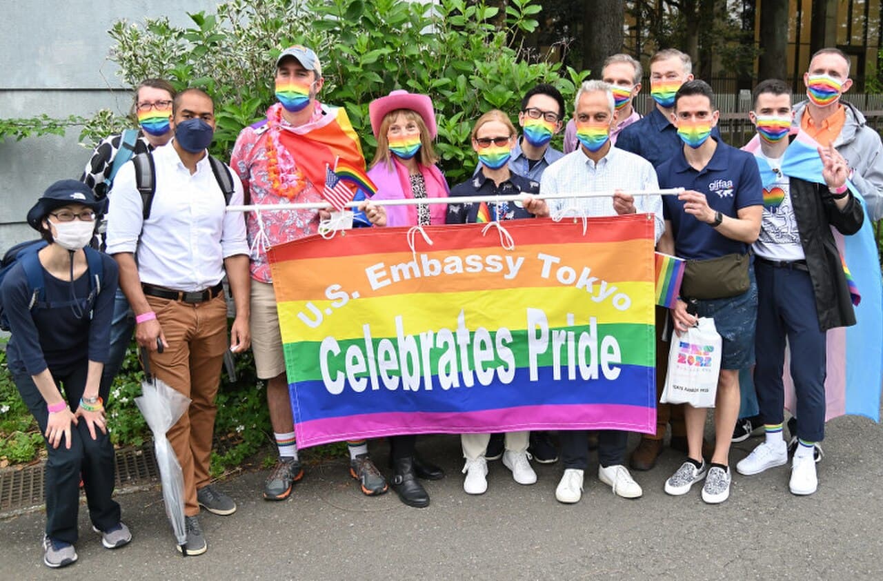Marchers with rainbow flags in the Tokyo Rainbow Pride parade