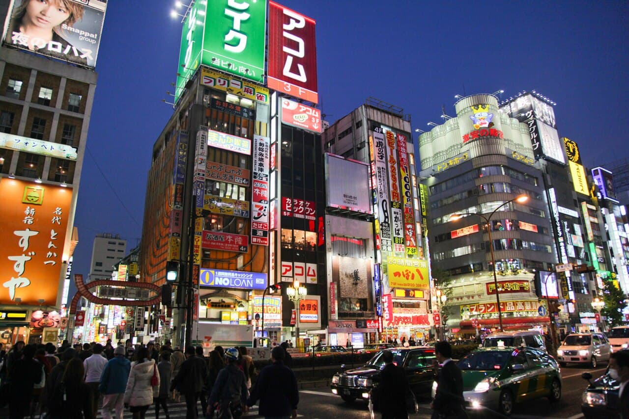 Neon-lit nightlife street in the Kabukicho district of Shinjuku, Tokyo, at night