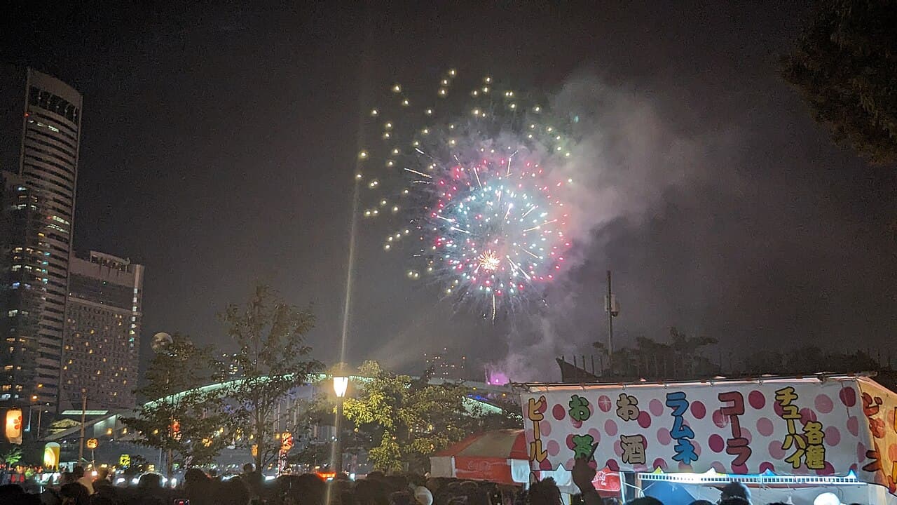 Fireworks over the river during Tenjin Matsuri, Osaka