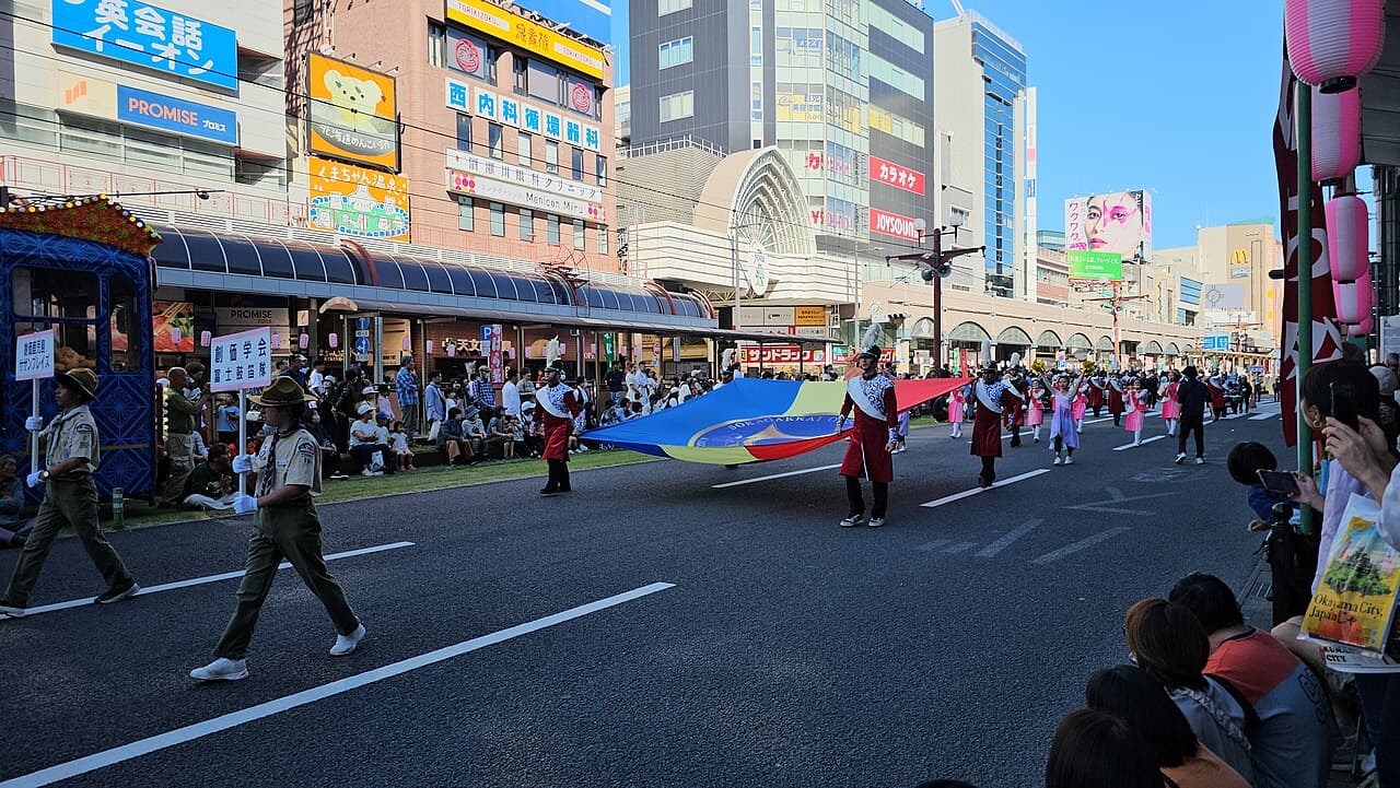 Marching parade dancers at the 2024 Ohara Festival in Kagoshima's Tenmonkan district
