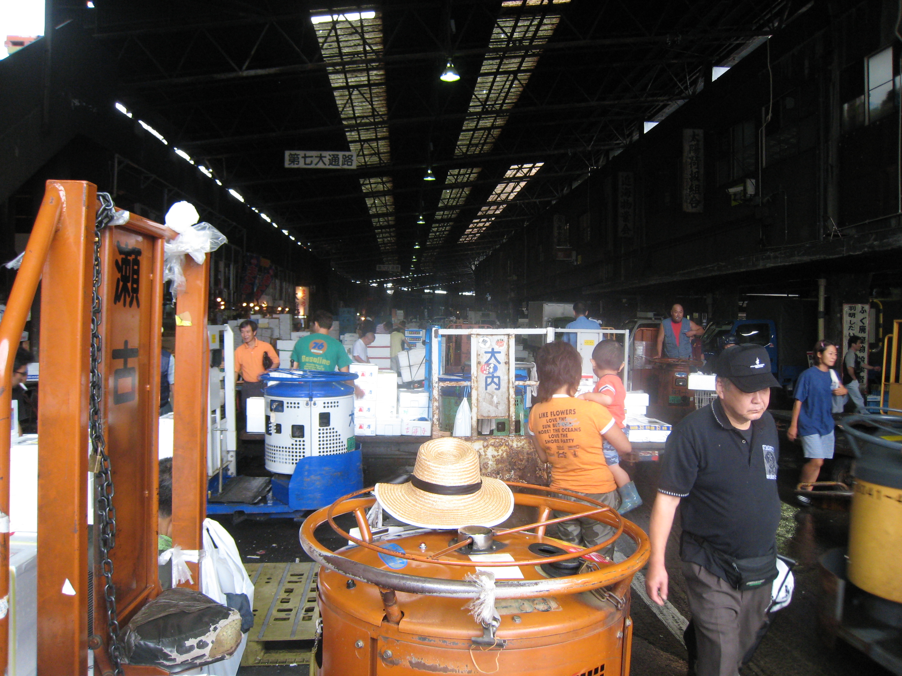 Stalls and vendors at the Tsukiji fish market in Tokyo